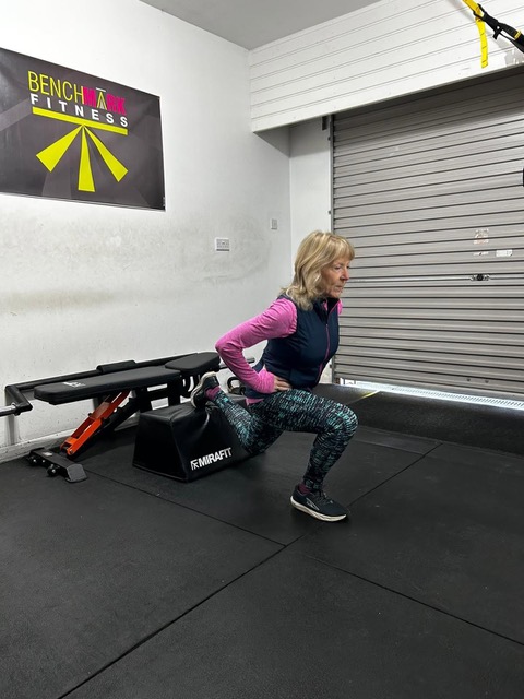 Andrea strength training in the gym