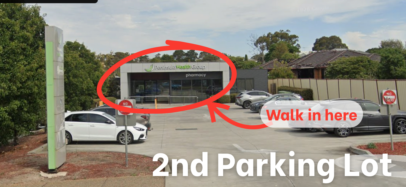 The second parking lot, closest to Peninsula Health Group entry