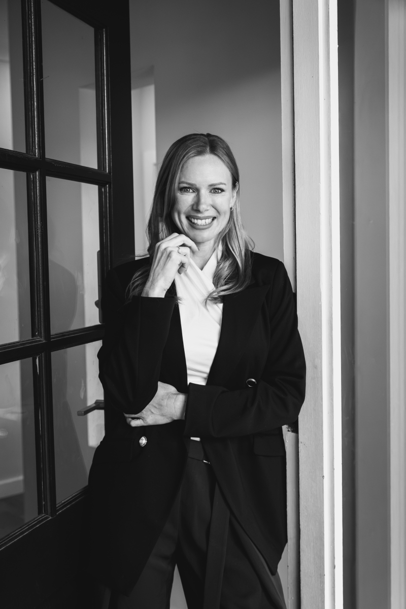 Caitlin Morrison in conversation with a client