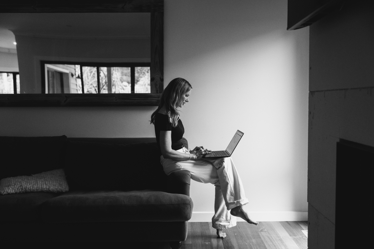 Caitlin Morrison working quietly at her laptop