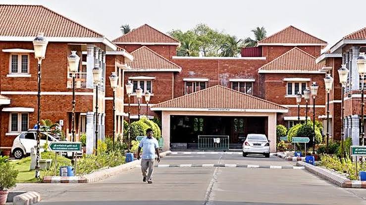 Tree-lined avenue between guest house blocks