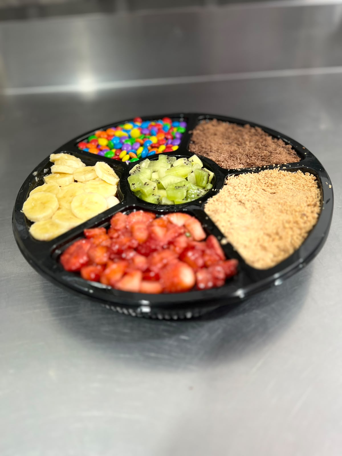 Roleta de açaí com diversos acompanhamentos