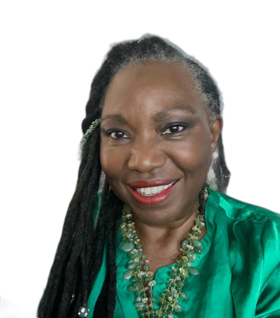 Clan Mother Shifa Ali Scott, palms open in sacred offering, amethyst crystal in her hair