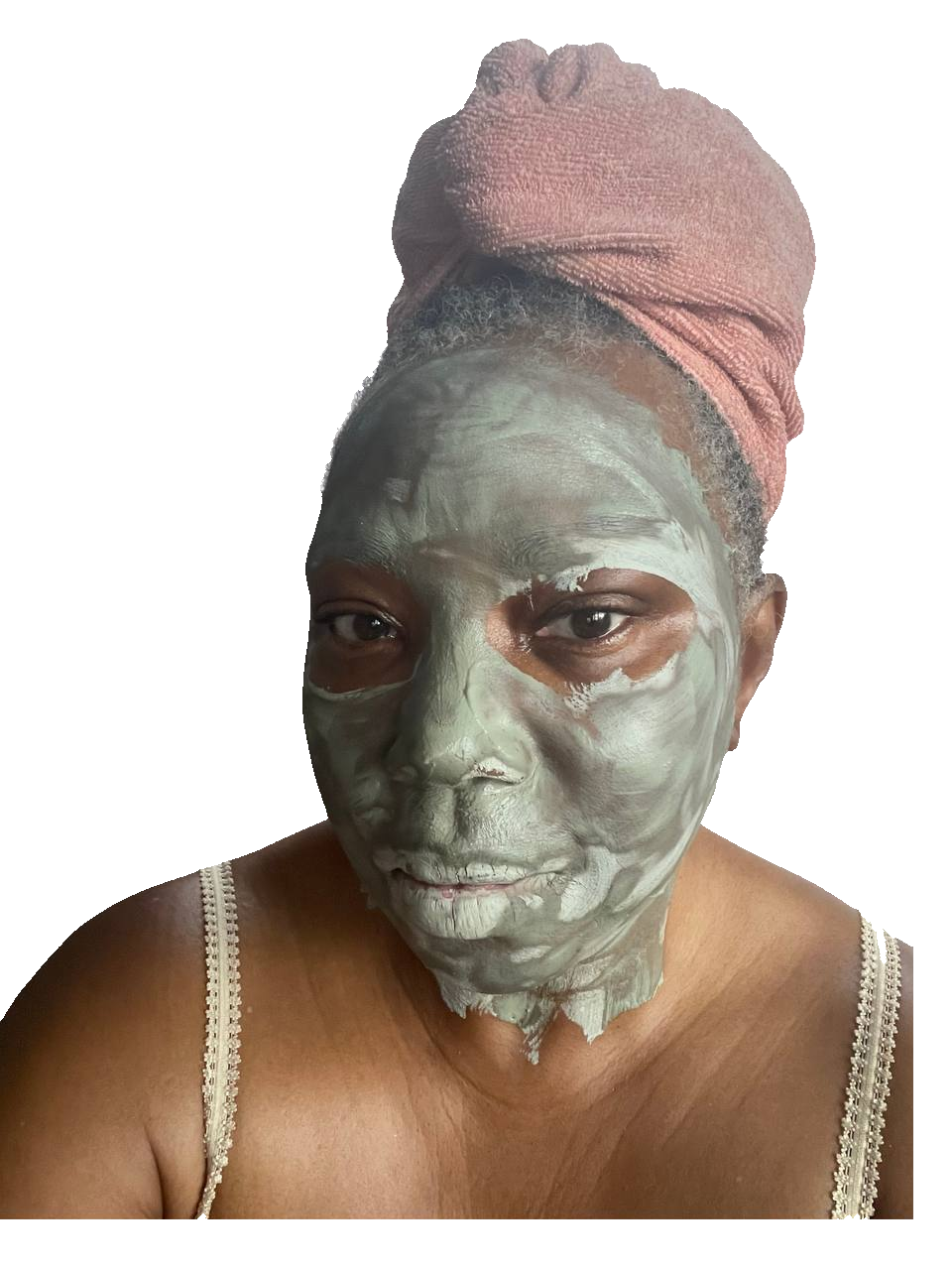 Clan Mother Shifa with clay mask ritual on her face, knowing eyes looking directly forward